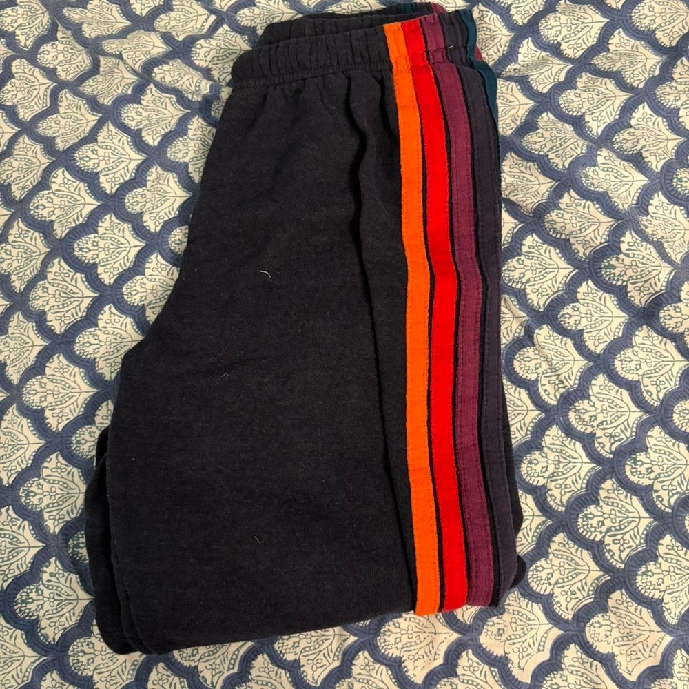 navy aviator nation sweatpants with sunset colored stripes
size-s